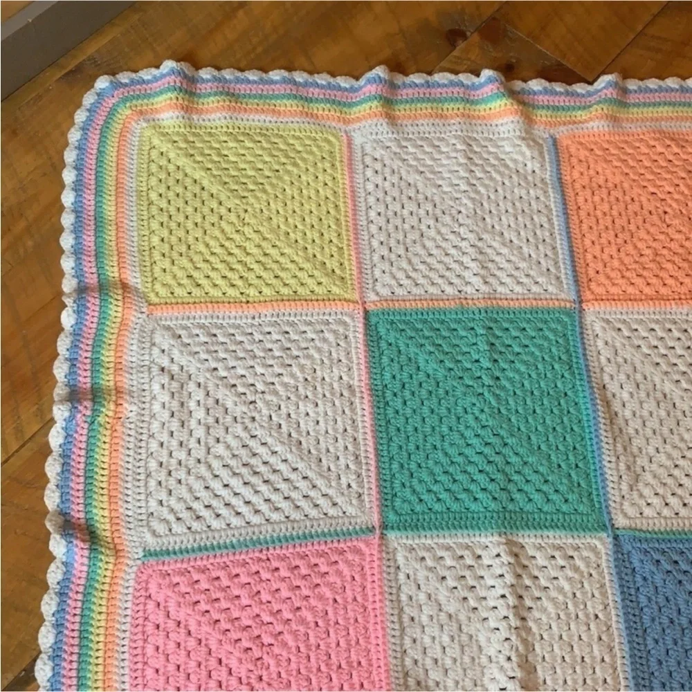 Handmade crochet baby blanket in pastel colors / colorblock pattern